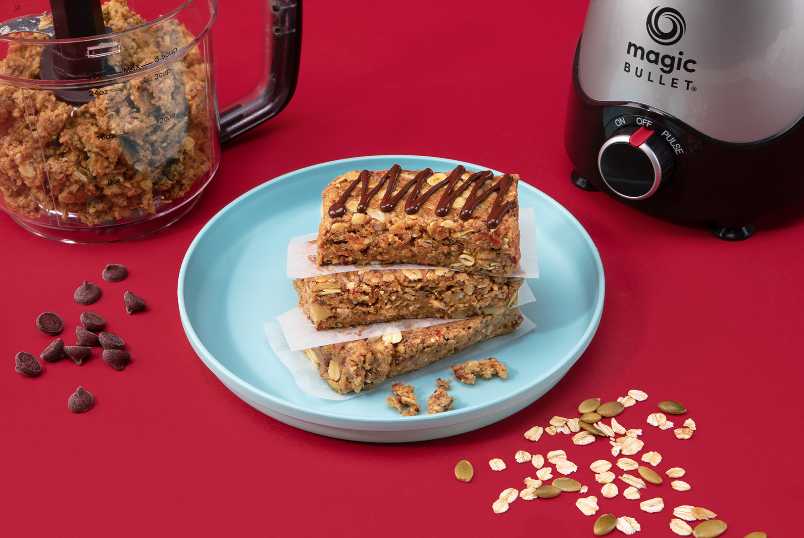 stack of peanut butter granola bars with chocolate drizzle and chocolate chips