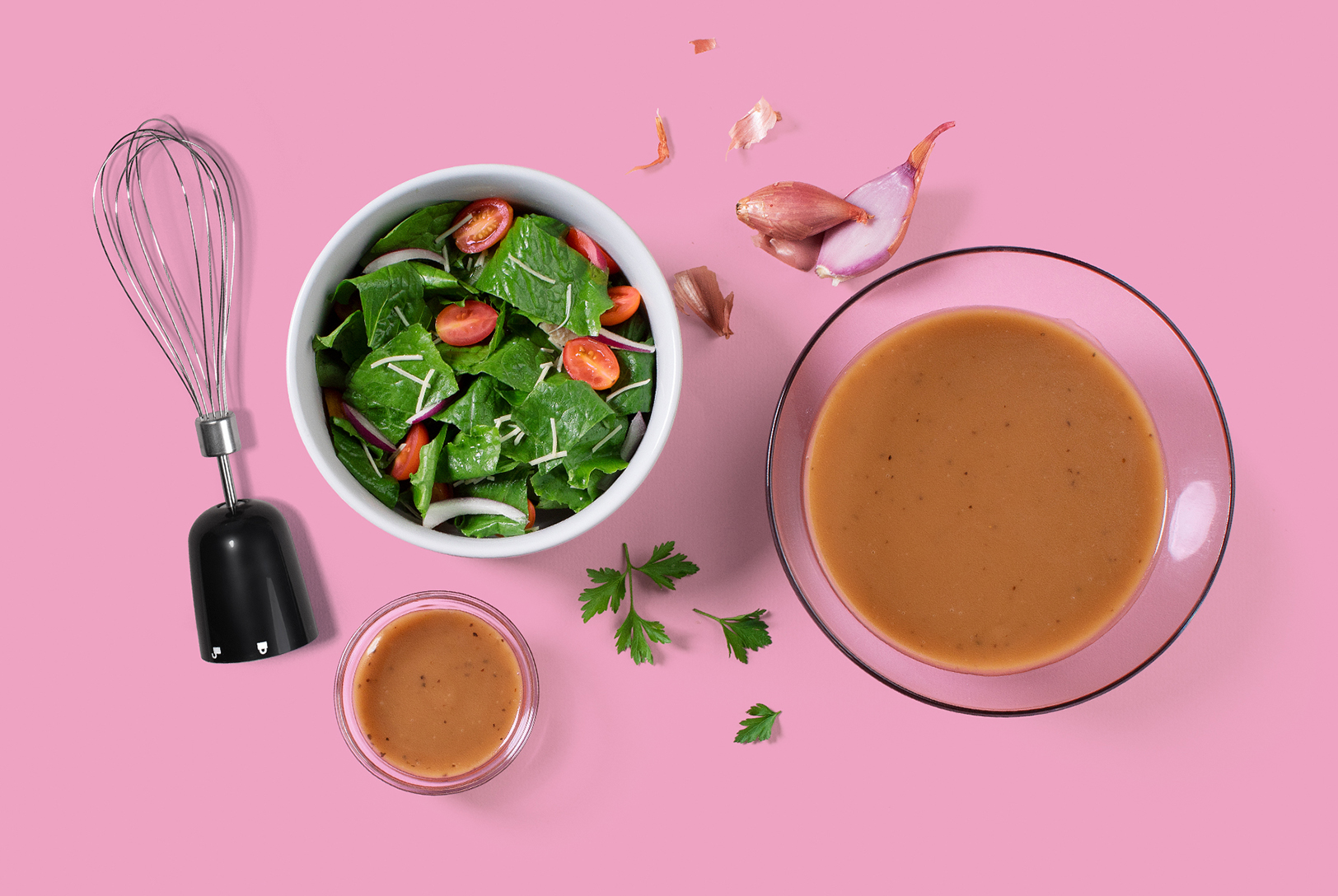 bowl of spinach and tomato salad with balsamic dressing and immersion blender attachment