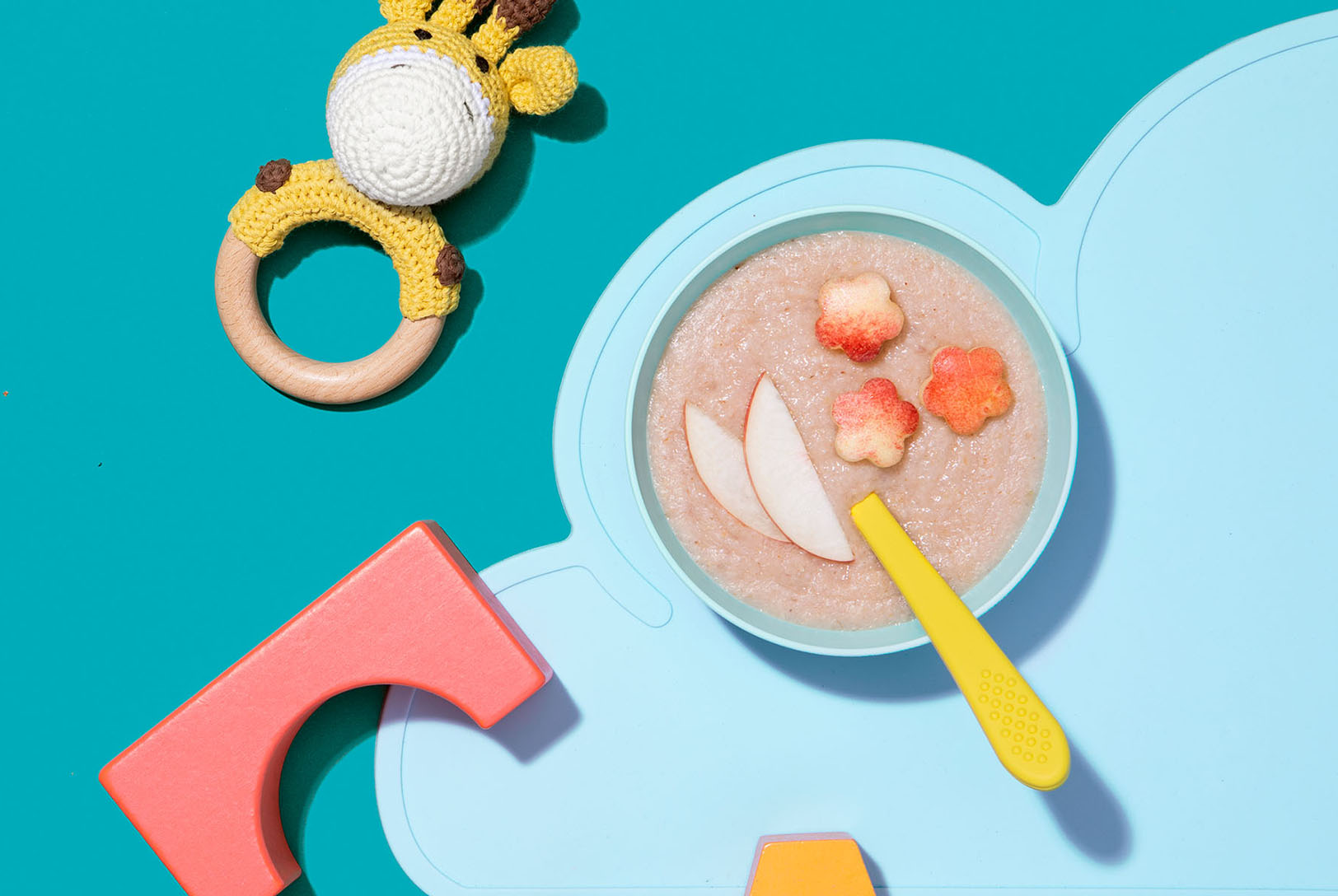 bowl of peach oatmeal with sliced peaches on top