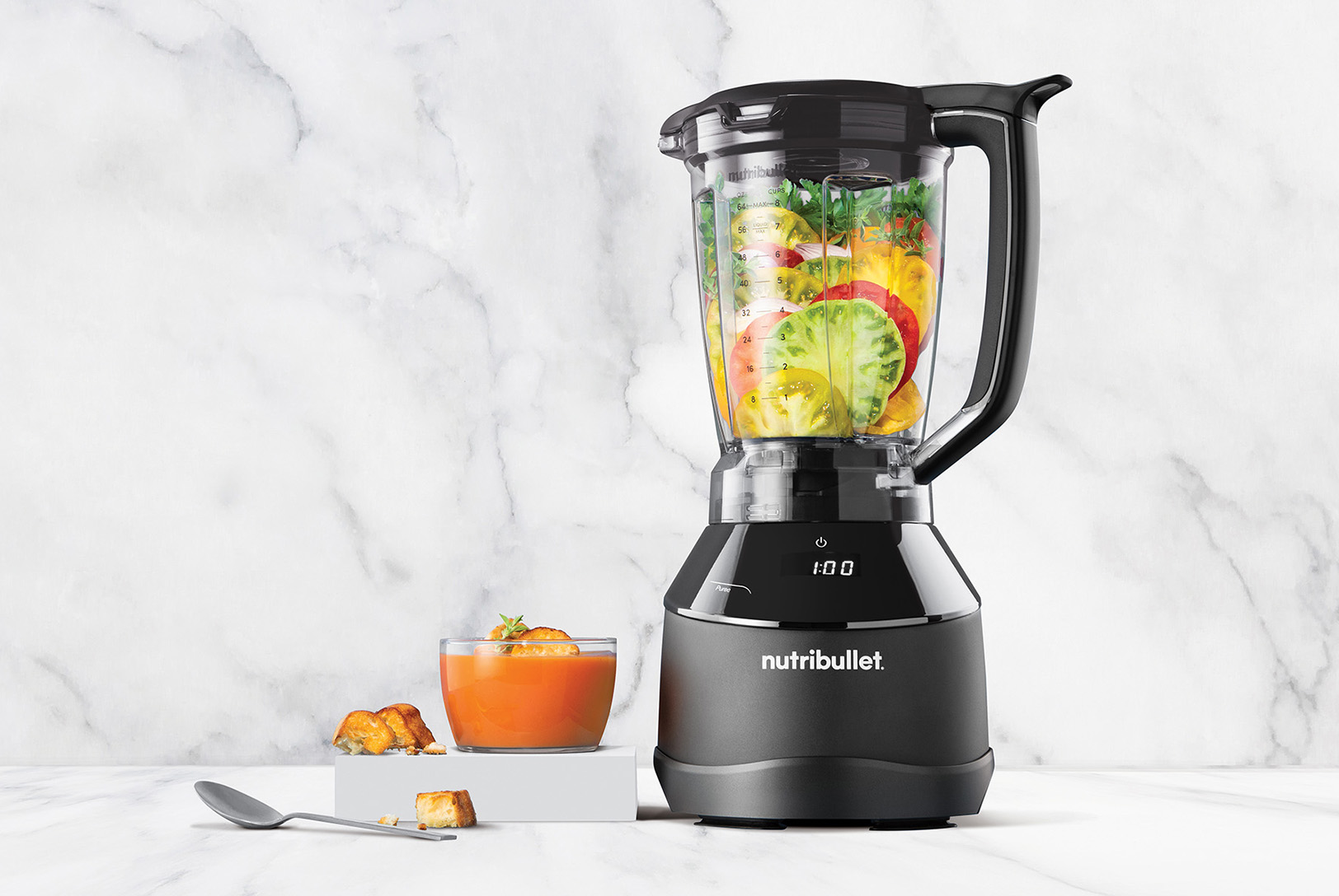 nutribullet Triple Prep filled with ingredients for Heirloom Tomato Soup