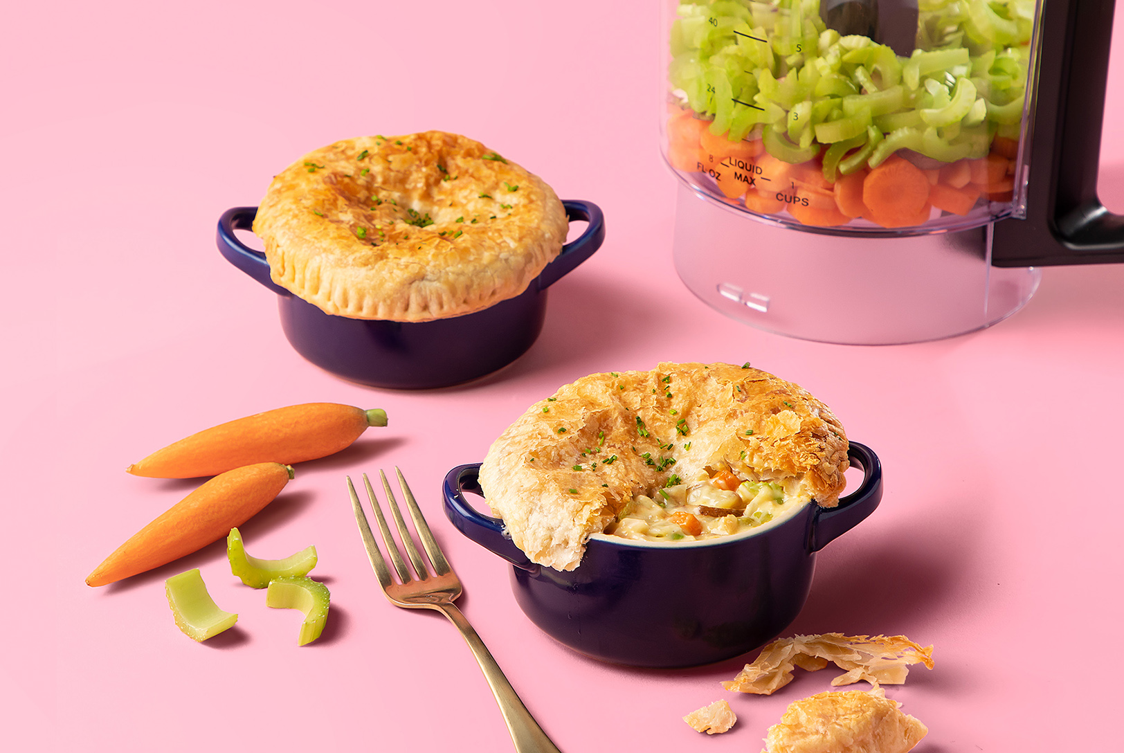 single serving chicken pot pies in ramekins next to nutribullet Triple Prep unit