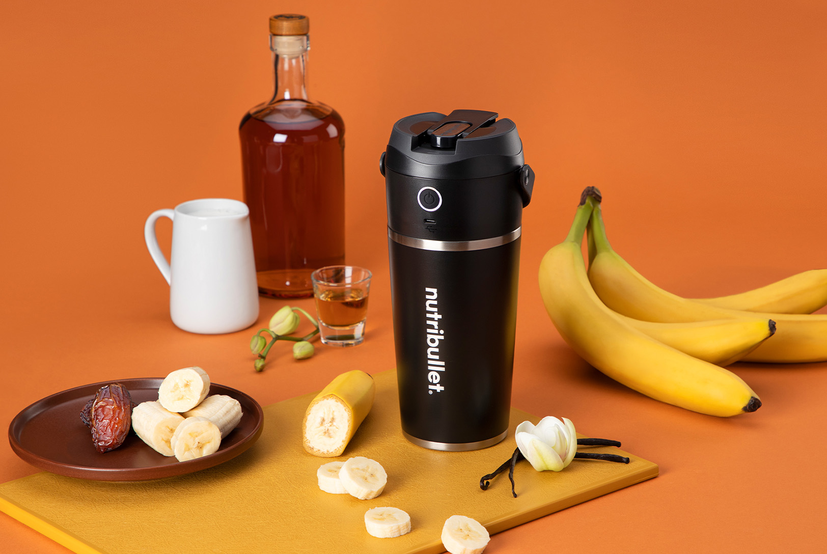 Black nutribullet Flip with bananas, dates, vanilla extract, and rum
