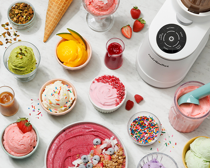 A white nutribullet Chill ice cream maker sits on a kitchen counter next to a glass container, with bowls and cones of ice cream in the background. On the right, a headline and short text introduce articles about making frozen treats.