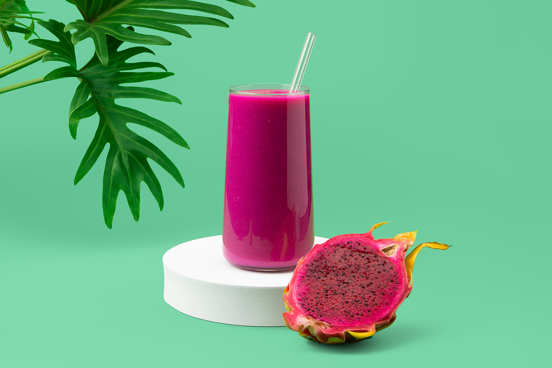fuchsia smoothie with dragonfruit and palm tree
