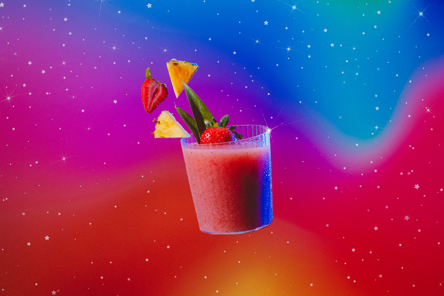 Capricorn inspired rum, lime, strawberries, and coconut cocktail with pineapple and strawberry floating garnish in cosmic atmosphere
