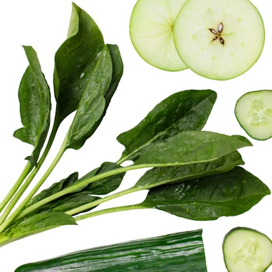flat lay of spinach, green apples, and cucumber